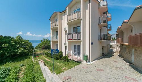 One-Bedroom Apartment with Balcony and Sea View