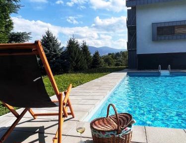 One-Bedroom Apartment with Balcony and Mountain View  