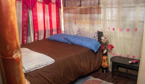 Standard Double Room with Shared Bathroom
