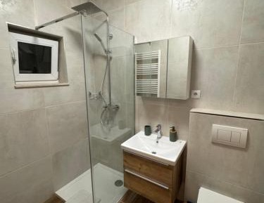 Three-Bedroom Apartment with Balcony