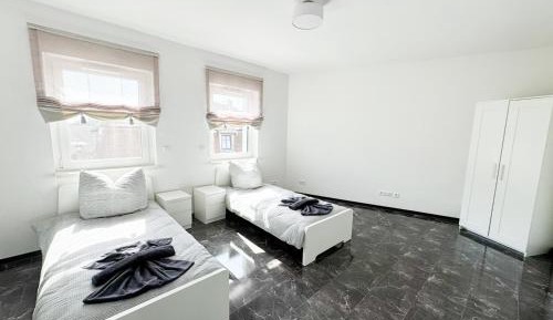 Two-Bedroom Apartment with Balcony