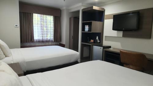 One Room Suite with Two Queen Beds and Sofa bed - Non Smoking