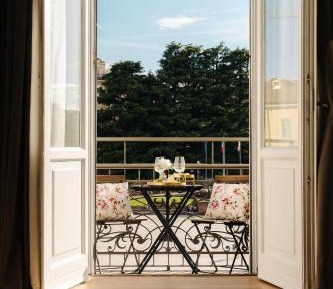 One-Bedroom Apartment with Balcony and City View