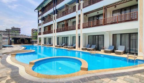 Luxury King Room or Two Queen Bedroom with Balcony and Pool View
