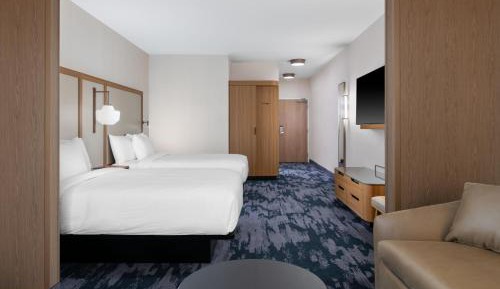 Extended Queen Suite with Two Queen and Sofa Bed