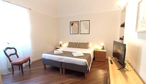 One-Bedroom Apartment with Balcony and City View