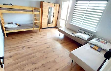 Single Bed in Dormitory Room