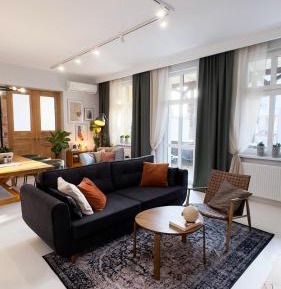 One-Bedroom Apartment with Balcony and City View