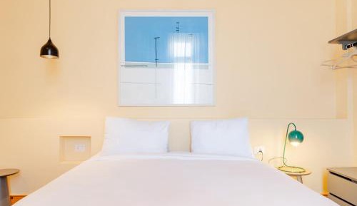 One-Bedroom Apartment with Balcony and City View