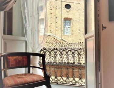 One-Bedroom Apartment with Balcony and City View