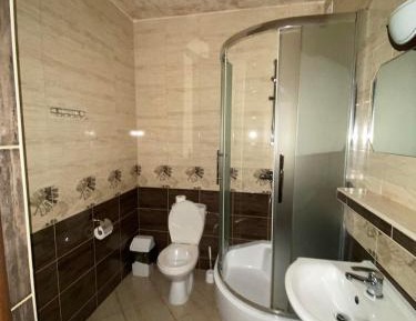 Quadruple Room with Private Bathroom