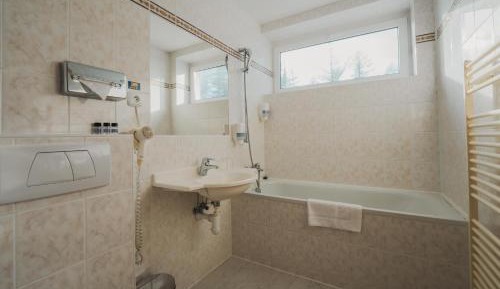 Double or Twin Room (2 Adults + 2 Children)