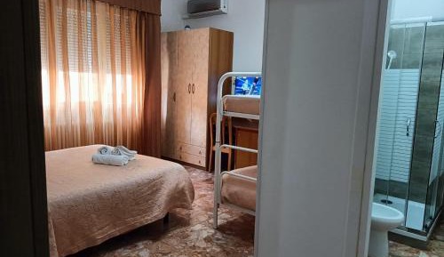 Quadruple Room with Private Bathroom