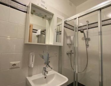 Quadruple Room with Private Bathroom