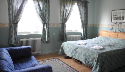 Economy Family Room (2 Adults + 2 Children) with Shared Bathroom