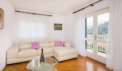 Two-Bedroom Apartment with Balcony and Sea View