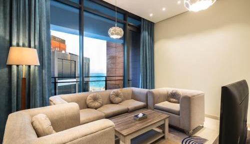 Deluxe Suite with Partial Sea View