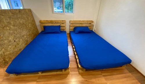 Single Bed in Dormitory Room