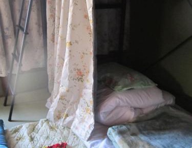 Single Bed in Dormitory Room