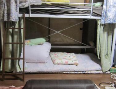 Single Bed in Dormitory Room
