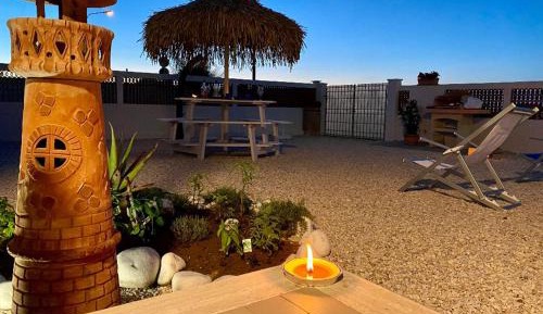 Beachfront Apartment with Garden