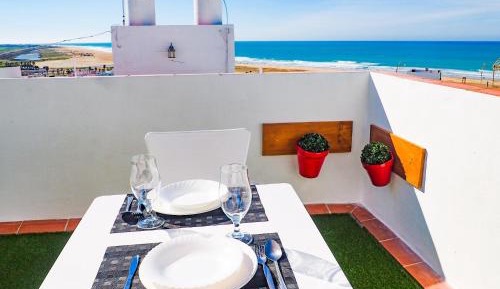 One-Bedroom Apartment with Balcony and Partial Sea Views