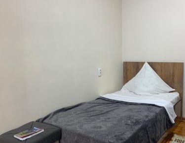 Single Bed in Female Dormitory Room