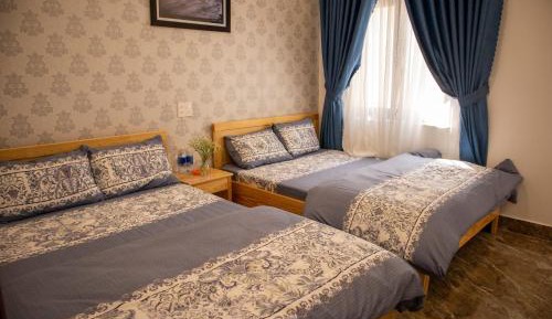 Quadruple Room with Private Bathroom