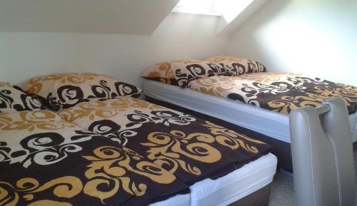 Quadruple Room with Shared Bathroom