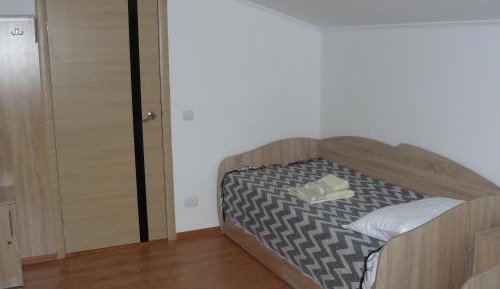 Single Bed in Dormitory Room