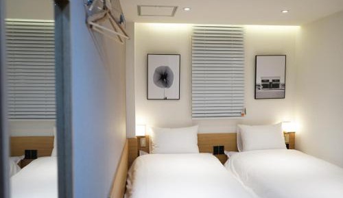 Twin Room with Private Bathroom