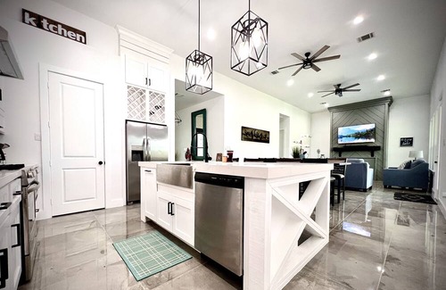 Trinity House | Lakefront property located in a private golf course community