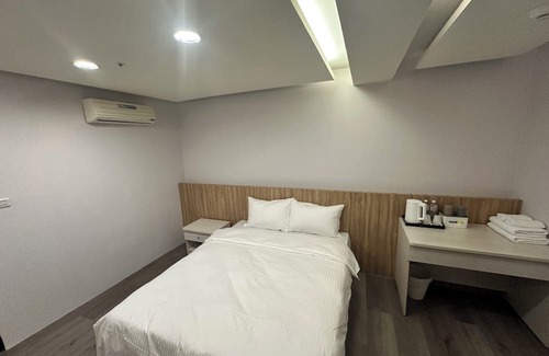 West District House | Star Yi Hotel