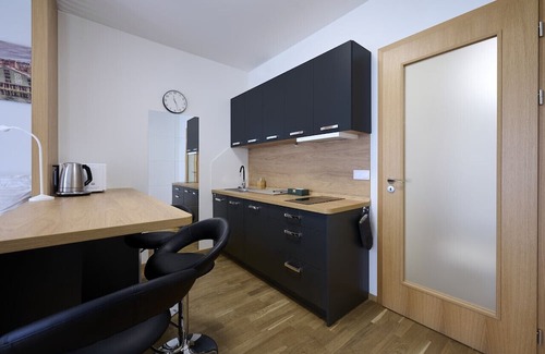 Prague 9 Apartment | Garden Giggles: Ground-Floor Fun in the Sun