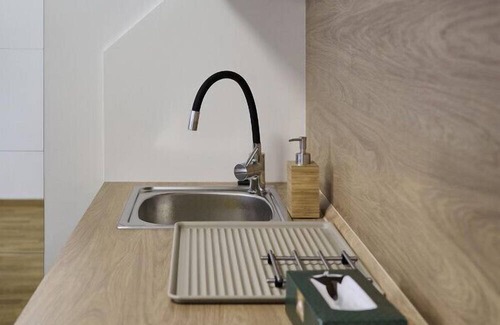 Prague 9 Apartment | Garden Giggles: Ground-Floor Fun in the Sun