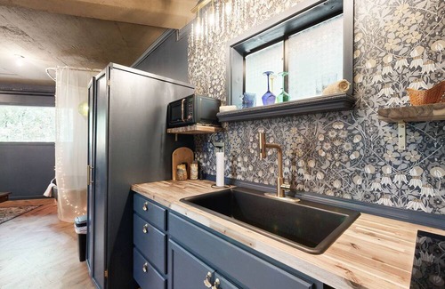 Lost Bridge Village House | Charming Retreat with Luxurious Amenities and Unique Cave Features