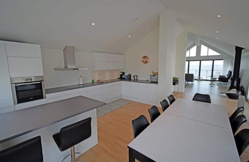 Vestbygd House | Holiday home 'Seaside' in a spectacular location directly by the sea in Borhaug-Borshavn on Listafjorden, Farsund municipality, southern Norway, 10 adults and 3 kids, new build 2017, plot directly between harbor and sea, panoramic windows and terr.
