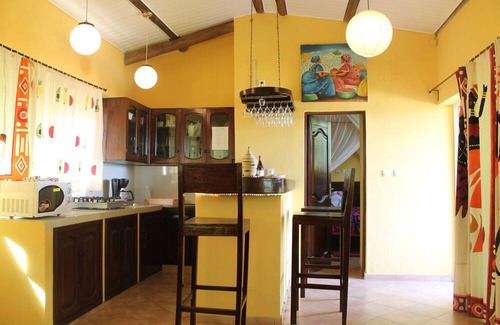 Bujumbura Apartment | Cozy serviced one bedroom apartment in a tropical garden, free laundry