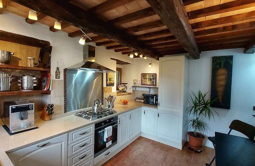 Penna San Giovanni House | San Isidore, a meticulously restored historic Italian home with a stunning pool.