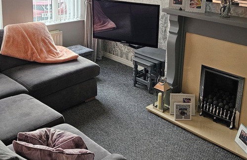 Newcastle House | Semi detached home with garage. 3 bedrooms, 3 bathrooms. Treadmill in garage.