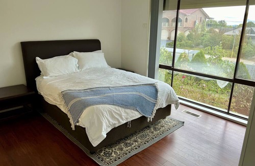 McKellar House | Charming 4-Bedroom Retreat with Ensuite Spa and Tranquil Backyard