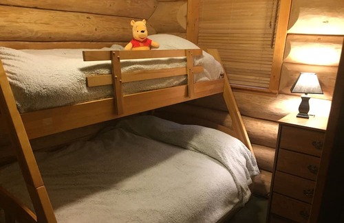 Sunshine Valley Cabin | Welcome to Serenity! A cozy log cabin in a beautiful area to relax & recharge.