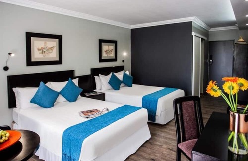 Maseru House | A Haven of Comfort & Convenience: Pool View, Shuttle Service and Free Parking!