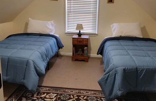 Adin House | Cozy up at Serenity with its picturesque views, where the West still lives.