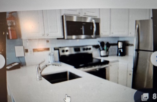 Colliers Bay Condo | Morritt's Tortuga Club :Three pools , lovely beach and pier. 2Bd/2Bth.