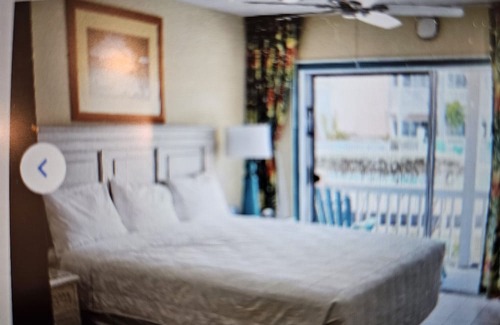 Colliers Bay Condo | Morritt's Tortuga Club :Three pools , lovely beach and pier. 2Bd/2Bth.