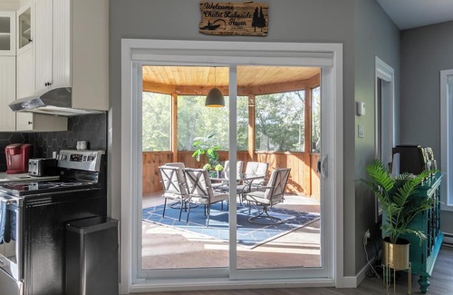 Bouchette Ski Chalet | Modern Lakefront Chalet with Games Room, Gym, Wrap Around Balcony & Scenic Views