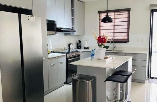 Puerto Barillas House | Superb townhome with Spacious Backyard and Volcano views