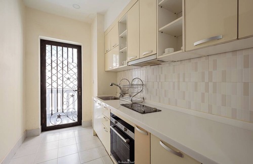 Chamkar Mon Apartment | Cozy 2BR Condo with Hardwood Floors & Rooftop Sunset View in Charming Phnom Penh