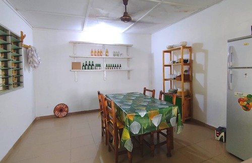 Aneho Villa | Room with lounge and garden near the beach in Aneho. Quiet neighborhood.